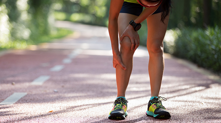 Female runner with knee or shin pain